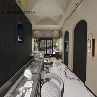 Conception personnalisée d'intérieur de bijouterie complète, vitrine à bijoux en verre, présentoir mural pour bijoux avec éclairage