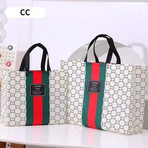 Bolsas de Compras Reutilizables y Portátiles, Bolsas de Tela No Tejida Reciclable - Product Image 1