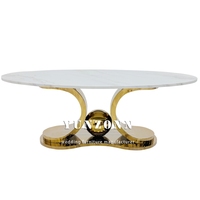 Meubles de maison modernes de luxe, table basse en acier inoxydable doré avec un design ovale pour usage hôtelier