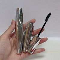 Tube de mascara vide de luxe avec brosse en silicone, nouveau produit en gros de l'usine Jinlan, conteneur rond argenté pour cils, tube de maquillage