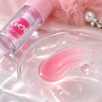 Nouvel Arrivage Brillant à Lèvres Oreilles de Lapin avec Charme, Marque Privée OEM/ODM, Sangle Pompon Rose, Clip Portable, Indispensable en Voyage
