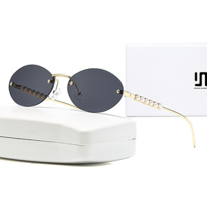 Nuevas gafas de sol sin montura de estilo europeo americano con adornos de perlas, protección UV400 para mujer, montura metálica, lentes negras - Product Image 4