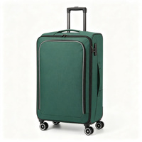 Valise à roulettes souple en tissu vert avec ouverture par le dessus, compartiment profond, poche avant et serrure à combinaison