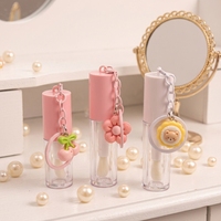 Tubes de brillant à lèvres vides multicolores avec logo personnalisé, petits contenants d'huile à lèvres avec porte-clés pendentif mignon, fournisseur d'emballages de brillant à lèvres