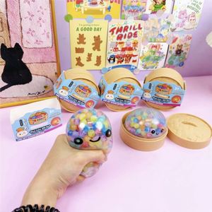 Vente en gros usine : Jouet sensoriel anti-stress TPR Squishy en forme de boulette avec visage souriant, Boîte mystère surprise à paillettes pour adultes - Product Image 2