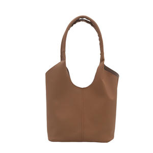2025 nuevo bolso de mano con patrón de lichi marrón claro bolso simple diario versátil - Product Image 1