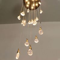 Lampe suspendue longue en cristal créative de luxe moderne minimaliste nouvelle en cuivre en spirale avec télécommande en laiton