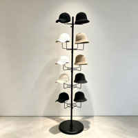 Présentoir à chapeaux rotatif noir autoportant, support de rangement multicouche pour casquettes, idéal pour l'affichage en magasin de vêtements