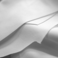 Tela Elástica de Poliéster y Algodón Cepillado Resistente al Desgaste para la Fabricación de Prendas de Aislamiento Térmico, Sudaderas y Camisetas de Primera Calidad