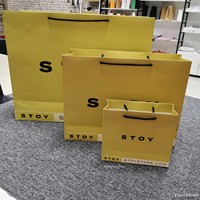 Sac en papier d'emballage pour bijoux de luxe en carton blanc de qualité supérieure avec logo de marque