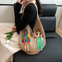 Nouvel arrivage à la mode estivale Sac à main shopping personnalisé mignon pour dame Sac à bandoulière de plage creux pour les vacances en bord de mer avec patch