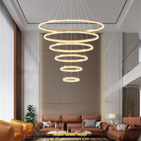 Salon moderne et minimaliste Salle à manger Hall d'hôtel familial Cercles multicouches Anneau en or Lustre à LED