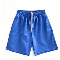 Short de bain pour homme à séchage rapide, bleu uni, avec cordon de serrage, short de plage décontracté, taille élastique, coupe ample, short de surf d'été, vente en gros personnalisée