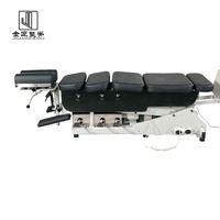 Table de chiropratique moderne inclinable à commande au pied, 4 points d'attache, structure métallique, capacité de charge 120 kg, pliable pour usage en hôtel et salle de sport