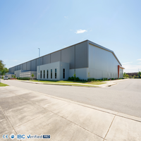 Entrepôt à structure métallique, directement de l'usine, à grande portée, préfabriqué, pour le stockage de machines lourdes