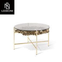 Pièce de table centrale nordique moderne et simple de luxe Table basse centrale latérale en laiton avec dessus en verre