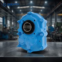 Réducteur de convoyeur à courroie hélicoïdale en fonte ductile robuste sur axe AXT, rapport de réduction 5:1, pour transport industriel