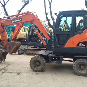 Hot Deals Última llegada Doosan Segunda mano DX60W Excavadora de ruedas Alto rendimiento Buen estado de funcionamiento Maquinaria de construcción - Product Image 1