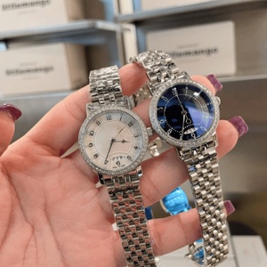 Montre pour femme avec lunette sertie de diamants ronds, cadran noir ou blanc et bracelet en acier inoxydable Longinesing - Product Image 2