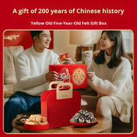 Assortiment de collations chinoises traditionnelles aux noix, graines de citrouille et barres de bonbons aux cacahuètes, boîte cadeau pour les fêtes