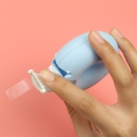 Coupe-ruban et support créatifs en plastique en forme de donut, papeterie coréenne invisible et portable pour les étudiants, idéal pour les travaux manuels sans risque pour les mains