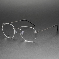 Lunettes sans monture en titane sans magnétique Structure sans vis Prescription irrégulière minimaliste Logo personnalisé en gros