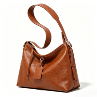Sac bandoulière de luxe pour femme en cuir véritable, style urbain minimaliste, avec fermeture éclair et sangle unique