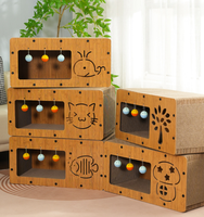 Grand lit-griffoir pour chat en carton ondulé moderne et mignon avec des balles en peluche suspendues, jouet interactif