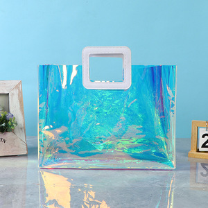 Sac fourre-tout transparent en PVC Xinye, plusieurs tailles, sac cadeau holographique pour emballage de vêtements - Product Image 1
