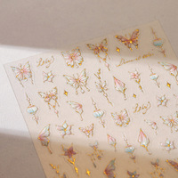 Autocollants pour ongles en forme de papillon et de branche de fleurs en or rose, design élégant et luxueux pour la manucure DIY à domicile