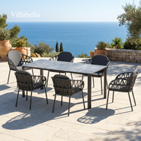 Ensemble de salle à manger d'extérieur moderne 7 pièces avec structure en aluminium, table en pierre frittée et chaises en corde tressée pour patio de complexe hôtelier
