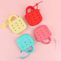 Porte-monnaie unisexe durable et tendance avec trous, résistant à l'eau, mini pochette zippée en silicone pour cartes, usage quotidien sans sangle