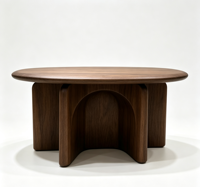 Table basse ovale en noyer de style mid-century, base sculpturale à découpe cintrée, table centrale minimaliste en bois massif pour salon