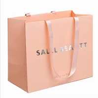 Sac en papier kraft de luxe imprimé sur mesure avec cordon de serrage, design personnalisé fait main, emballage pour vêtements de boutique, vente en gros d'usine