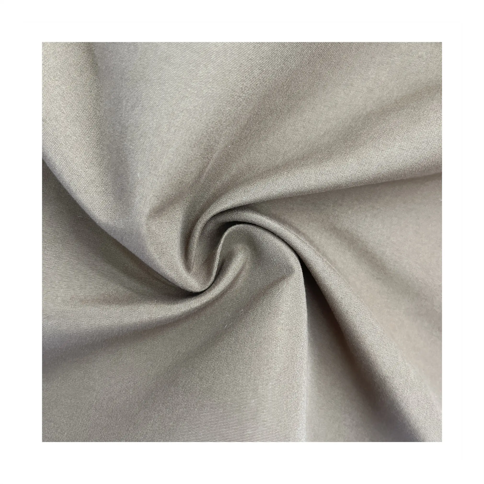 Tela de terciopelo de piel de melocotón tejida con patrón de satén de poliéster 100% de sensación suave personalizada para ropa, pantalones de playa