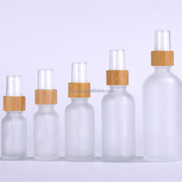 Couvercle en bois 5ml 10 ml 15ml 20 ml 30 ml 50ml 100ml 1 oz 30 ml huile essentielle sérum compte-gouttes en verre flacon noir opaque avec bouchon en bambou