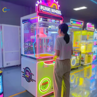 Machine à grue à roues KAIMI Punk |   Jeu d'arcade en métal à monnayeur avec garantie d'un an pour les parcs d'attractions