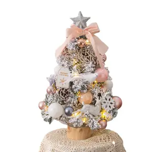 Albero di natale con luci desktop piccolo pacchetto fiocco rosa decorazione palla albero di natale