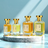 Großhandel Polyedrische Klare Glas-Parfümflasche 50ml 100ml Luxuriöse Leere Parfümflasche mit Golddeckel Individuelles Logo und Verpackung