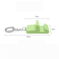 Porte-clés mousqueton rotatif à 360 degrés en silicone flexible, support de téléphone portable pour bureau avec conception antivol