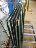 6mm 8mm 10mm verre flotté trempé Low-E pour murs rideaux d'hôtel capacité de charge 100KG 75 haute température 70MPa force 5 + ans