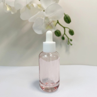 Flacon compte-gouttes en verre rose transparent personnalisé avec logo, forme cylindrique minimaliste, pour cosmétiques de voyage