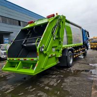 Camion Compacteur de Déchets Diesel Euro 3 Manuel 4x2 Howo 15m³ de Haute Qualité à Chargement Arrière pour le Transport et la Compression des Déchets