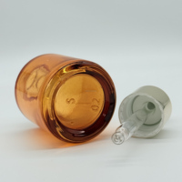 30ml Runde Glas-Tropfflasche mit Flacher Schulter, Silbernem Verschluss, Bernsteinfarben oder Transparent, mit Individuellem Logo-Siebdruck