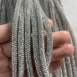 Venta directa de fábrica 8 filas 6mm de diámetro cuerda de cristal <span class=keywords><strong>Strass</strong></span> cordón suelto diamante Rhinestone cadena para sudaderas con capucha - Product Image 1
