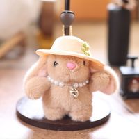 Mignon mini porte-clés et breloque de sac en peluche lapin doux et moelleux, avec pendentif cœur en perles, style machine à griffes