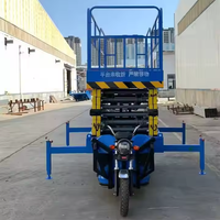 Tricycle élévateur à ciseaux électrique avec plateforme de levage aérienne mobile pour moto