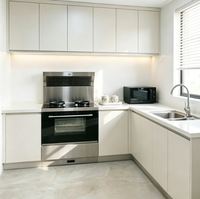 Ensembles complets d'armoires de cuisine modulaires européennes minimalistes en laque mate anthracite sans poignées avec éclairage LED pour crédence