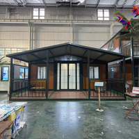 Maison préfabriquée en conteneur de 40 pieds avec 3 chambres à coucher Salon Extensible Atelier Cuisine Salle de bain Kiosque Application