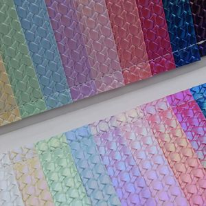 Cuero Sintético de PVC con Textura Tejida Arcoíris, Alto Brillo, Grado Automotriz, Calandrado - Product Image 1